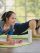 Adult asian man and woman family wearing sport outfit do exercise workout yoga for healthy self care at home
